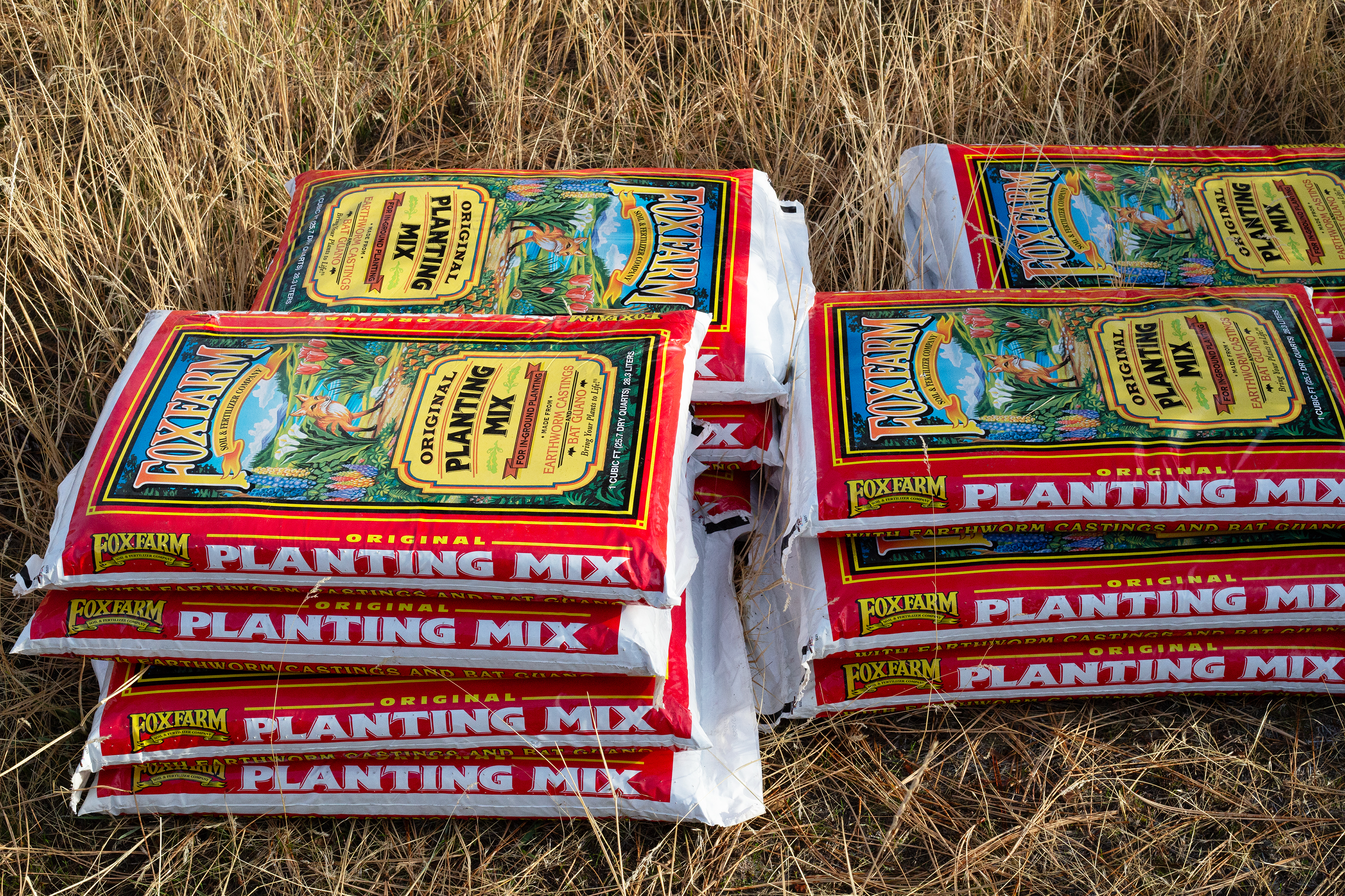 Some bags of FoxFarm planting mix soil